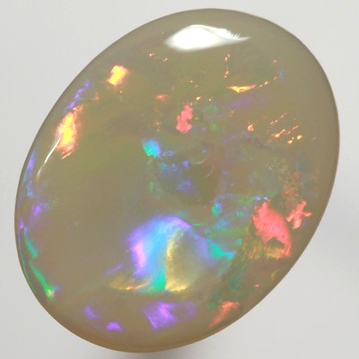 SOLID SEMI BLACK OPAL  Very bright fire in a Flag Harlequin pattern. SEE VIDEO